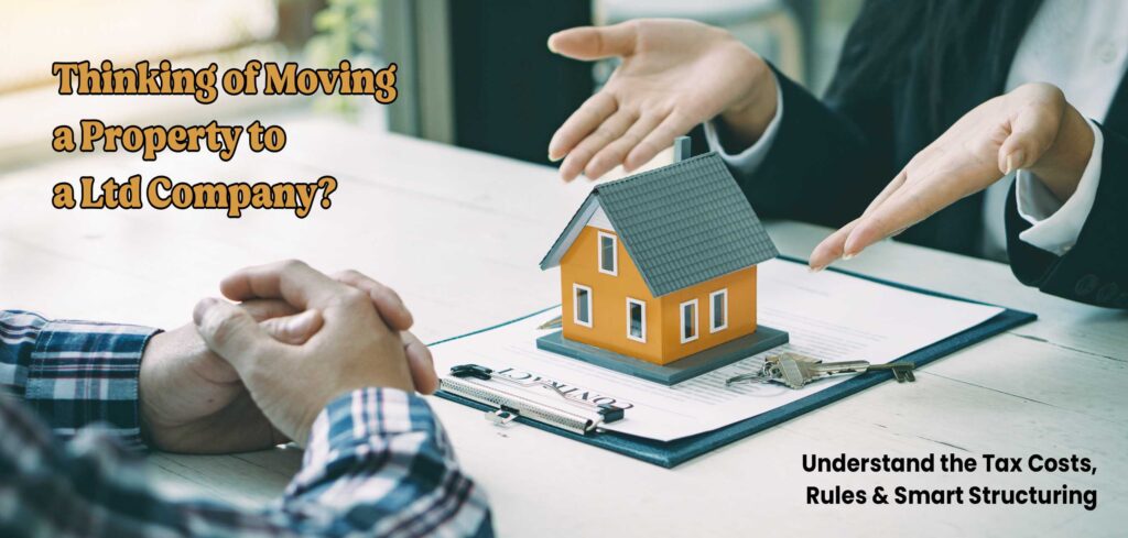 Transferring property to limited company consultation with house model and documents – tax implications and buy-to-let structuring advice.