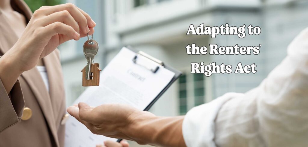 Landlord handing over house keys with contract document – adapting to the Renters’ Rights Act 2025 and new landlord regulations.