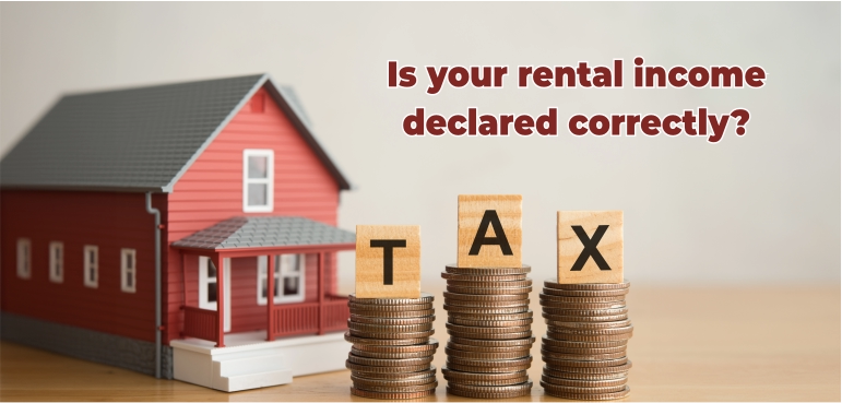 Rental income tax UK with house model and coins spelling TAX – declaring property income correctly to HMRC.